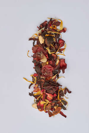 Dry hibiscus tea leaves with assorted fruits. Herbal tea leaves with fruits and flowers.の写真素材