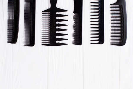 Set of hair combs on white background. Group of black hair combs. Space for text.の写真素材