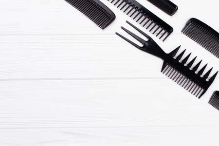 Set of hairdresser combs on white background. Professional hairdresser tools. Space for text.