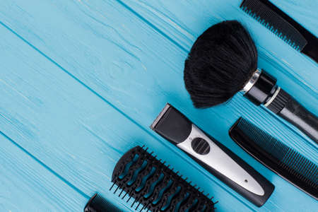 Tools for professional hairdresser on color background. Barber equipment and copy space.の写真素材