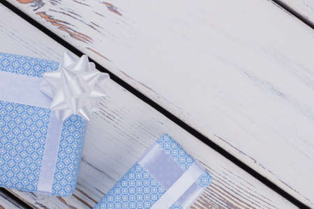 Gift boxes with copy space. Beautiful present boxes on vintage wooden background with text space....