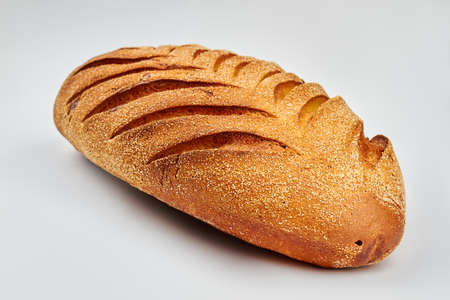 French bread on white background. Homemeade baguette with sesame seeds. Gluten-free homemade...