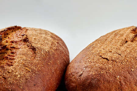 Healthy fresh bread and copy space. Delicious homemade bread on white background. Gluten-free bread recipe.の写真素材