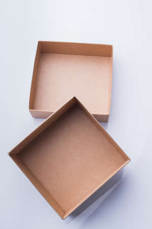 Empty pieces of a cardboard box, top view. Isolated on white.