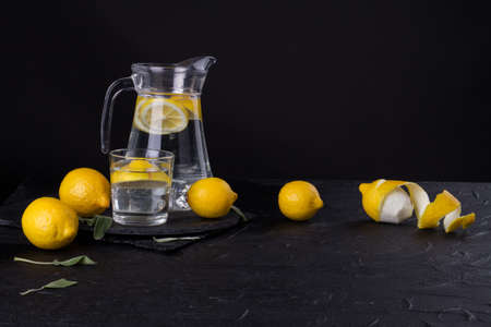 Lemon family in focus. Water and citrus is a nice tandem. Drink water is useful for health.の写真素材
