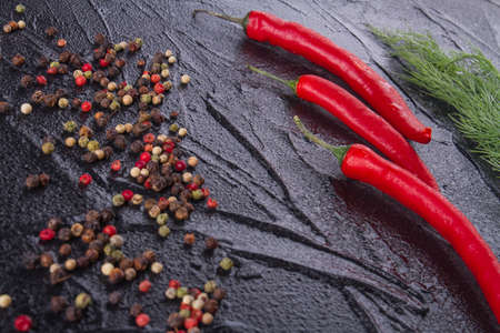 Condiments and red chili close up. Spicy mixture. Food concept.