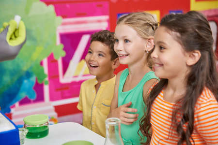 Happy kids on Birthday party. Entertainer at childrens party. Kids fun concept.の写真素材
