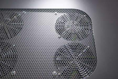 Grey cooling fan system with grid. Four radiator coolers.