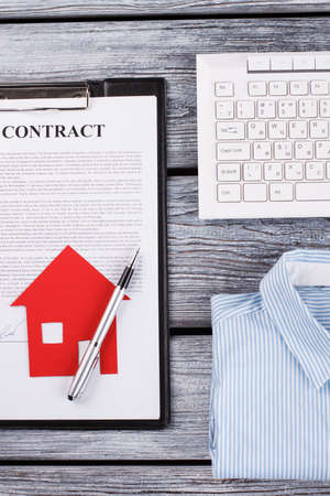 Cntract, shirt and keyboard. Rental of property. Realtors weekdays.の写真素材