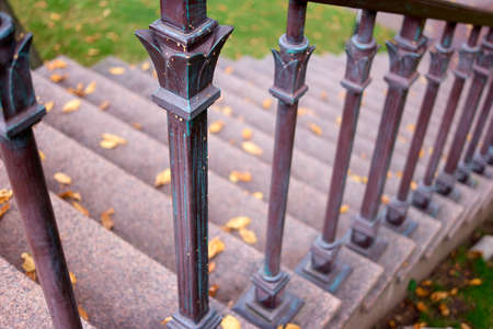Downstairs with metal railings. Close up.
