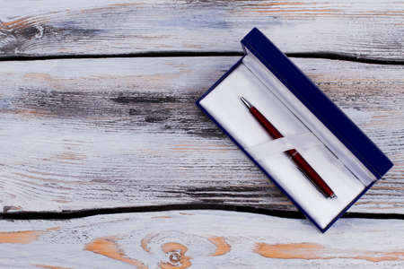 Pen gift box on white wooden table. Topview luxury pen gift box.の写真素材