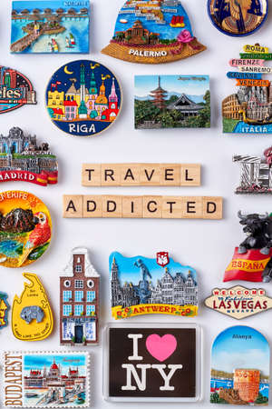 Flat lay travel collection of souvenirs. Concept of travel addicted man.の写真素材