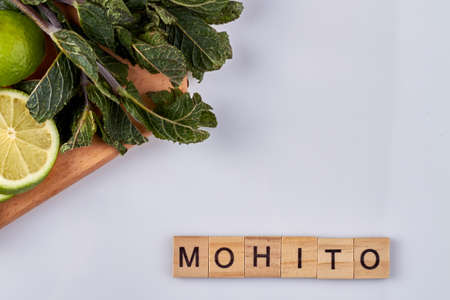 Mohito ingredients on wooden board. Isolated on white background.の写真素材