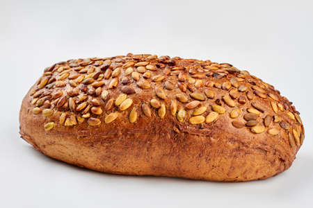 Organic grain wholemeal sourdough bread. Artisan organic wholemeal bread loaf. Isolated on white...