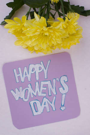 Happy womens day! Yellow bouquet isolated on white.の写真素材