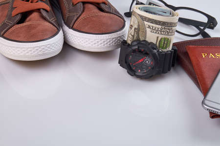 Rich traveler accessories and copy space. Isolated on white background.の写真素材