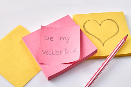 Be my valentine holiday card. Colored stickers and pencil on white.の写真素材