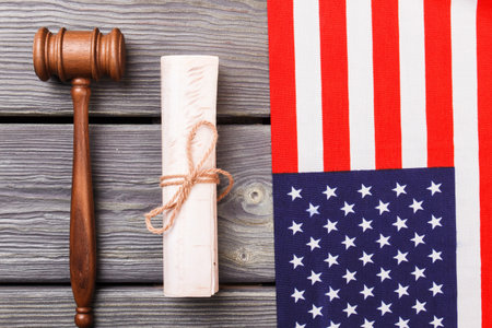 Usa flag with gavel and scroll. Independence declaration concept.の写真素材