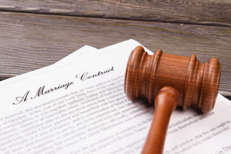 Close-up wooden gavel. Marriage contract concept.の写真素材