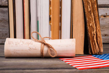 Scroll with books and usa flag. Independence declaration concept.