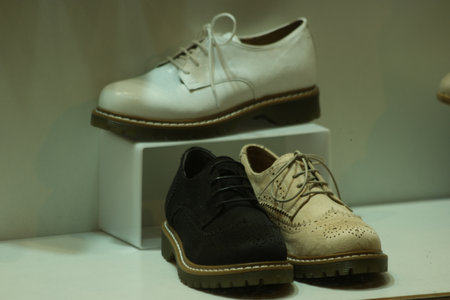 Womens footwear in shopping mall. Shop display with comfortable casual female shoes.の写真素材