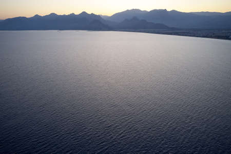 Sunset twilight on the sea. Seaside town of Turkey.の写真素材