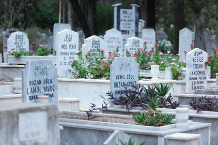 Gravestones and graves at Muslim cemetery.