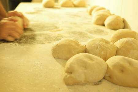 Dough pieces on table. Fresh bread dough.