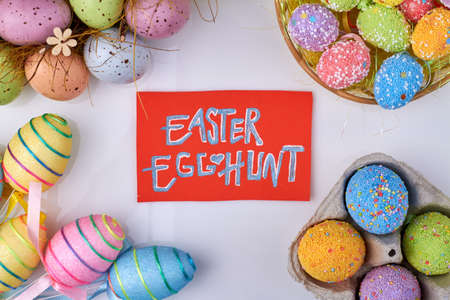 Easter egghunt concept. Composition of easter eggs flat lay.