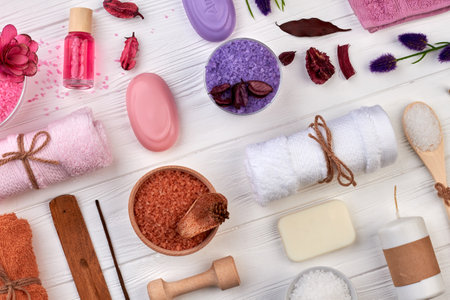 Bath body care spa accessories on white wooden desk.の写真素材