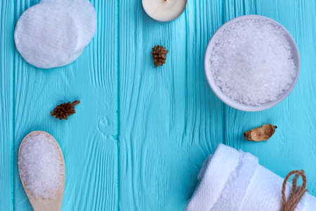 Set of bath accessories for spa on blue wooden desk.の写真素材