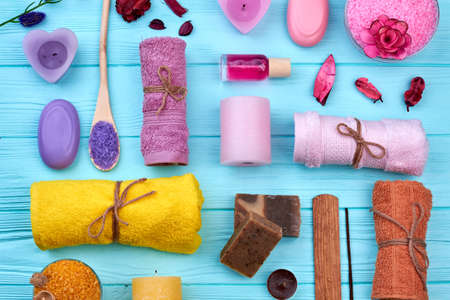 Set of aroma spa stuff on blue wooden table.の写真素材