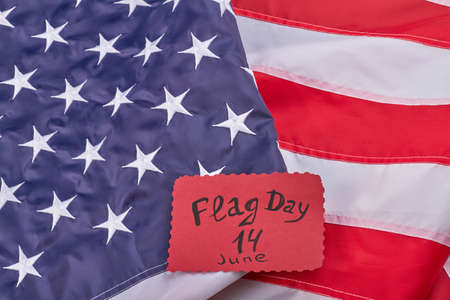 Flag day 14th june concept. American flag with stripes and stars. Top view flat lay.