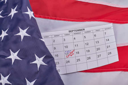 Constitution day of the United States 17th september top view flat lay. Fabric US flag with...