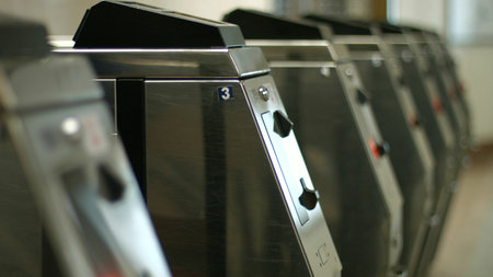 Turnstiles at the entrance to the subway. Public transport metro station.