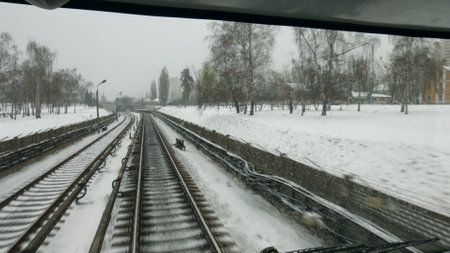 The train runs through the city. City electric train. A subway train goes outside.の写真素材