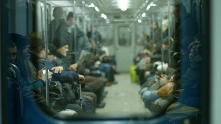 Kyiv, Ukraine - 05.01.2016: People go to work in the subway. A subway car with people.のeditorial素材