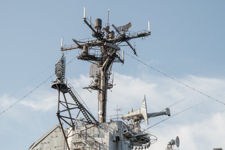 A high-resolution close-up captures the radar mast and antenna array on a historic military aircraft...