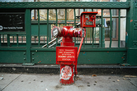 New York City, New York, USA - 08.03.2024: A red NYC Transit dry standpipe system is positioned...