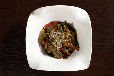 Delicious Korean salad sprinkled with sesame seeds, top view. Photos for restaurant and cafe menusの写真素材