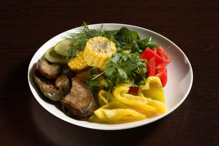 Salad, sliced vegetables: eggplant, zucchini, yellow, red and green bell peppers, corn. Photos for restaurant and cafe menusの写真素材