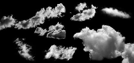 Set of white clouds isolated on black background