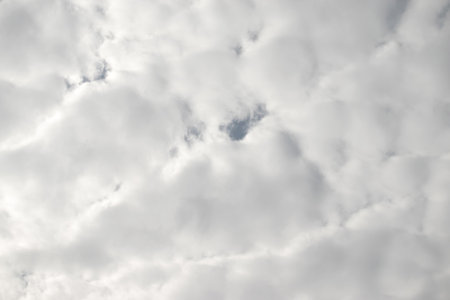 White fluffy clouds in the sky, background and textureの写真素材