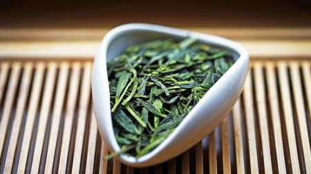 Chinese green tea Dragon Well in Tea presentation vessel, macroの写真素材