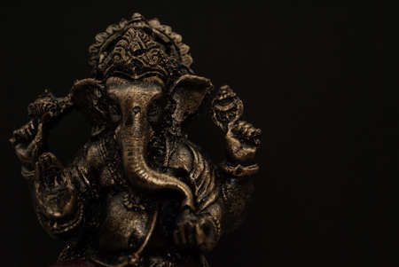 Ganesh idol on dark background