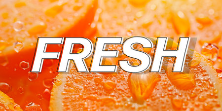 Fresh orange fruit slices with water drops on it. Word fresh.の素材