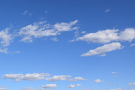 blue sky background with tiny clouds, closeup of photo, nature seriesの写真素材
