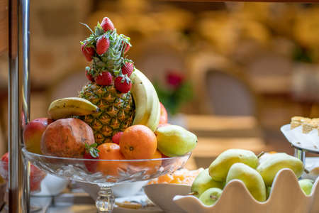 Authentic buffet, assorted fresh fruits, berries and citrus. Preparation for design creative menu.の写真素材