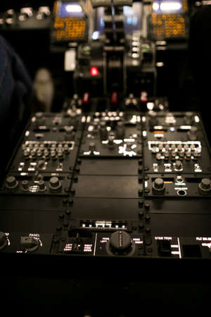 Aircraft interior, cockpit view inside the airliner. Point of view from a pilot place in a plane.