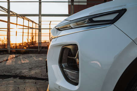 Close up detail on one of the LED headlights modern car.の写真素材